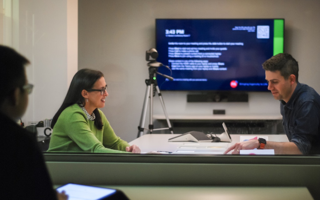 Melanie conducting an interview in a user research lab