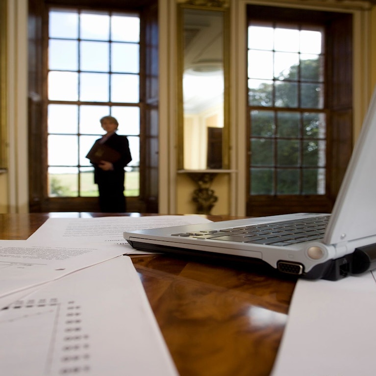 Woman standing at window