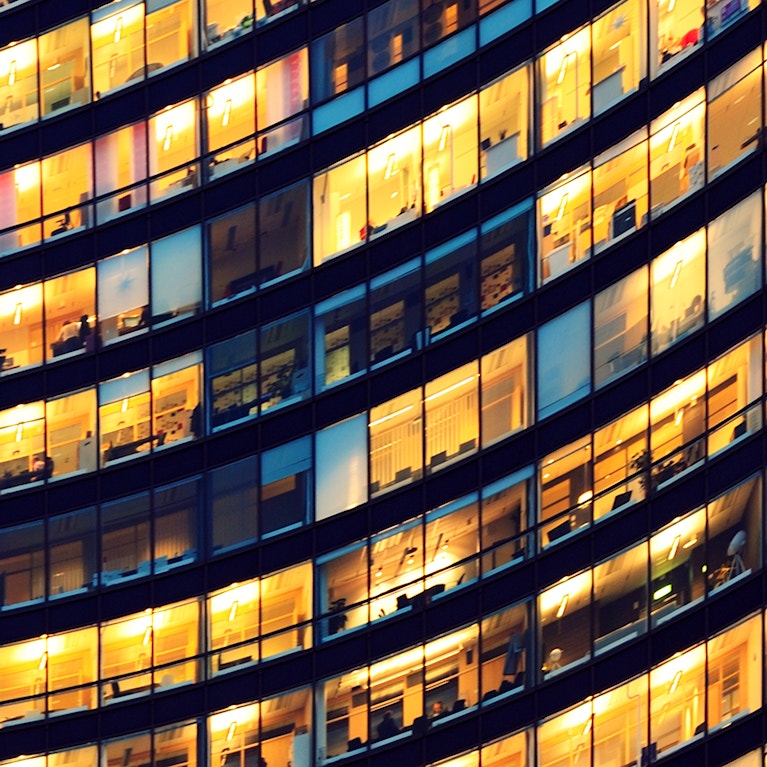 Office building illuminated at night