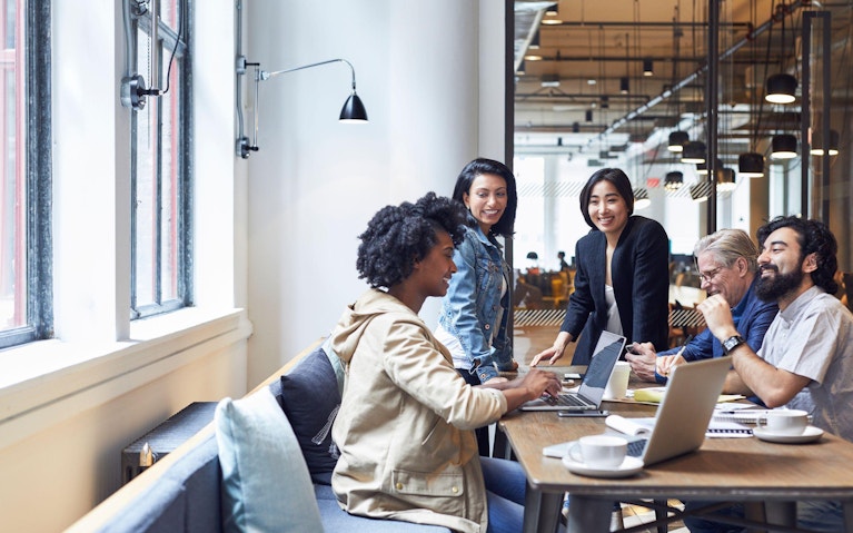 Colleagues working in office