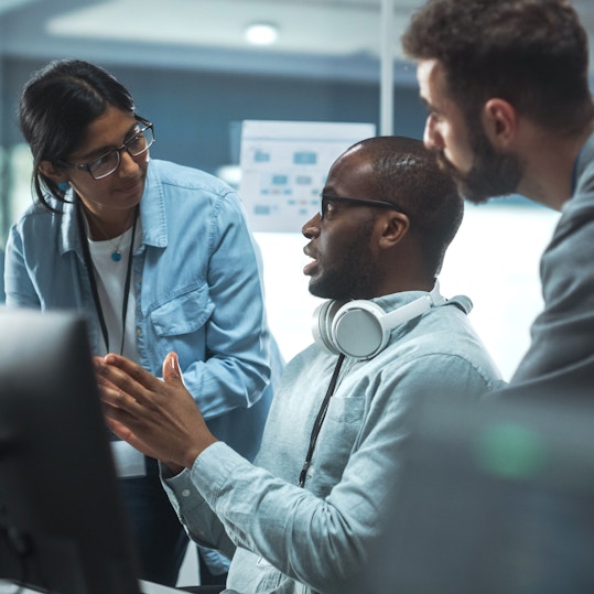 Technology workers collaborating