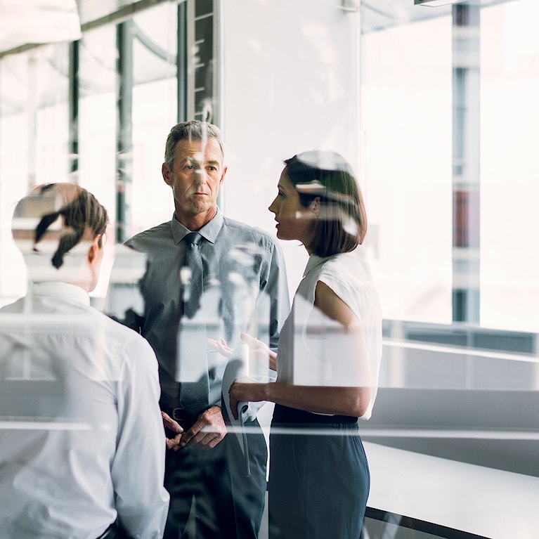 Business partners discussing in office