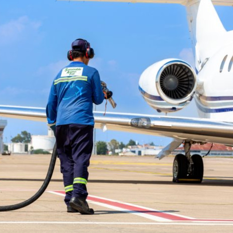 Refuelling plane on airport tarmac