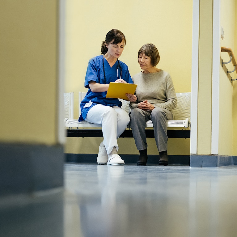 Doctor and senior patient at hospital